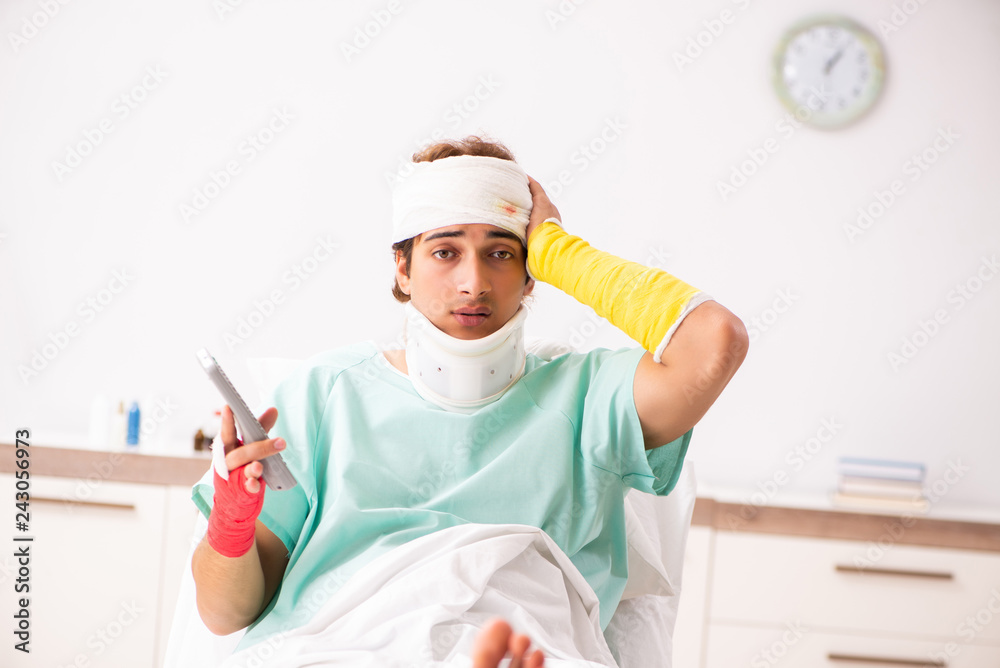 Young injured man staying in the hospital Young injured man staying in the hospital