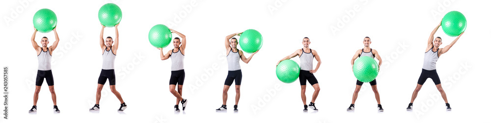 Man with swiss ball doing exercises on white