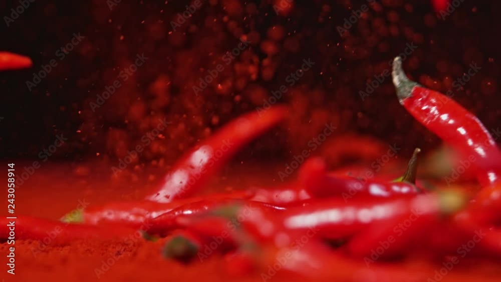 Falling chilli peppers into powder in super slow motion.