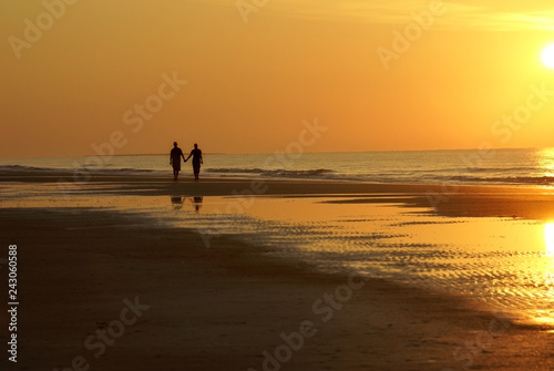 Couple Walking on Beach Silhouette
