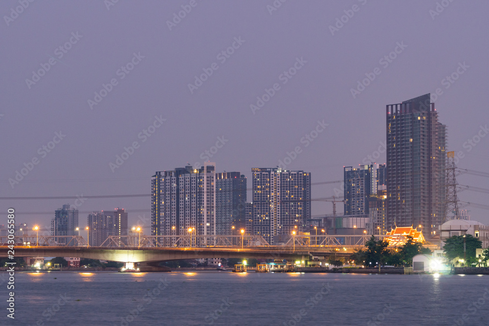 Fototapeta premium Bridge over river in Bangkok city.