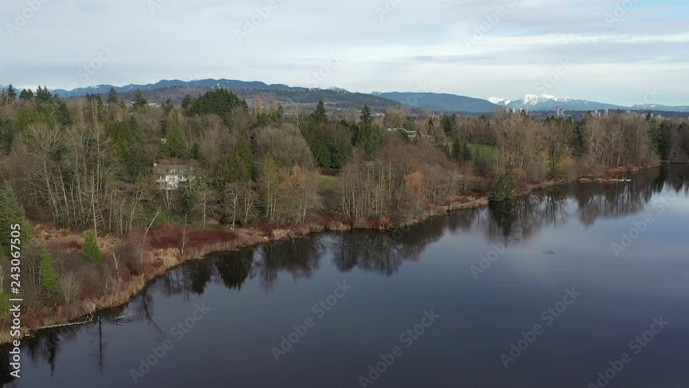 Aerial View at Mountain Lake in British Columbia, Canada. 4K. Aerial View at Mountain Lake in British Columbia, Canada. 4K.