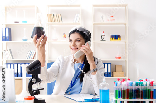 Female chemist working at the lab 