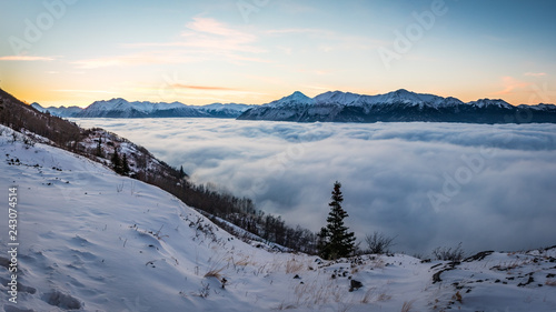 winter landscape with mountains and clouds