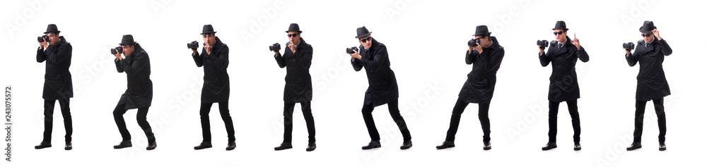 Spy with camera taking pictures isolated on white Spy with camera taking pictures isolated on white