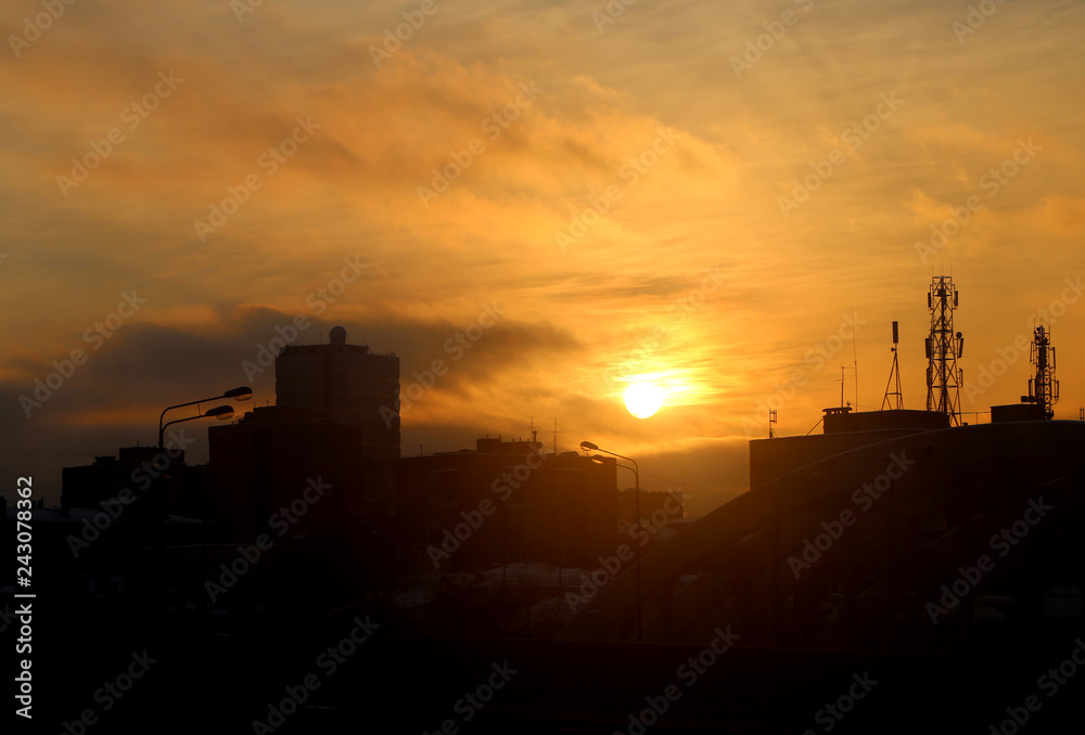 Bright photo background sunset in the city in the evening
