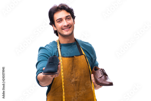 Young handsome shoemaker isolated on white