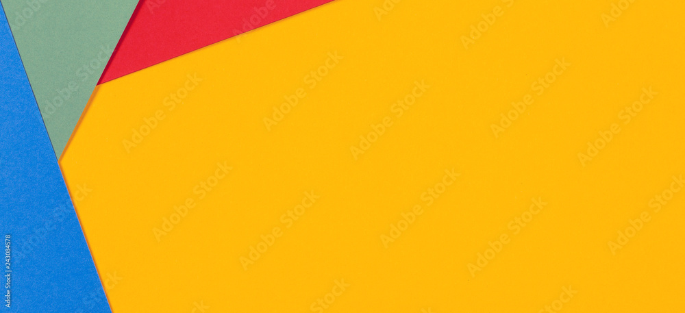 Geometric flat lay yellow green blue red color paper background Geometric flat lay yellow green blue red color paper background
