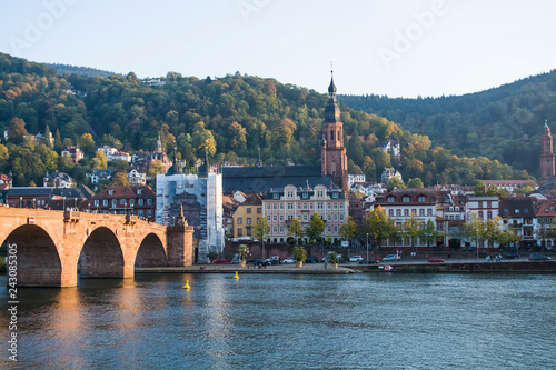 The tourist and historical, beautiful place in the old city of Heidelberg in Germany. Summertime of year. Walk. Starinny Bridge to the lock through the river.
