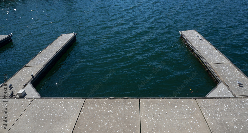 Empty boat dock with waterfront view.