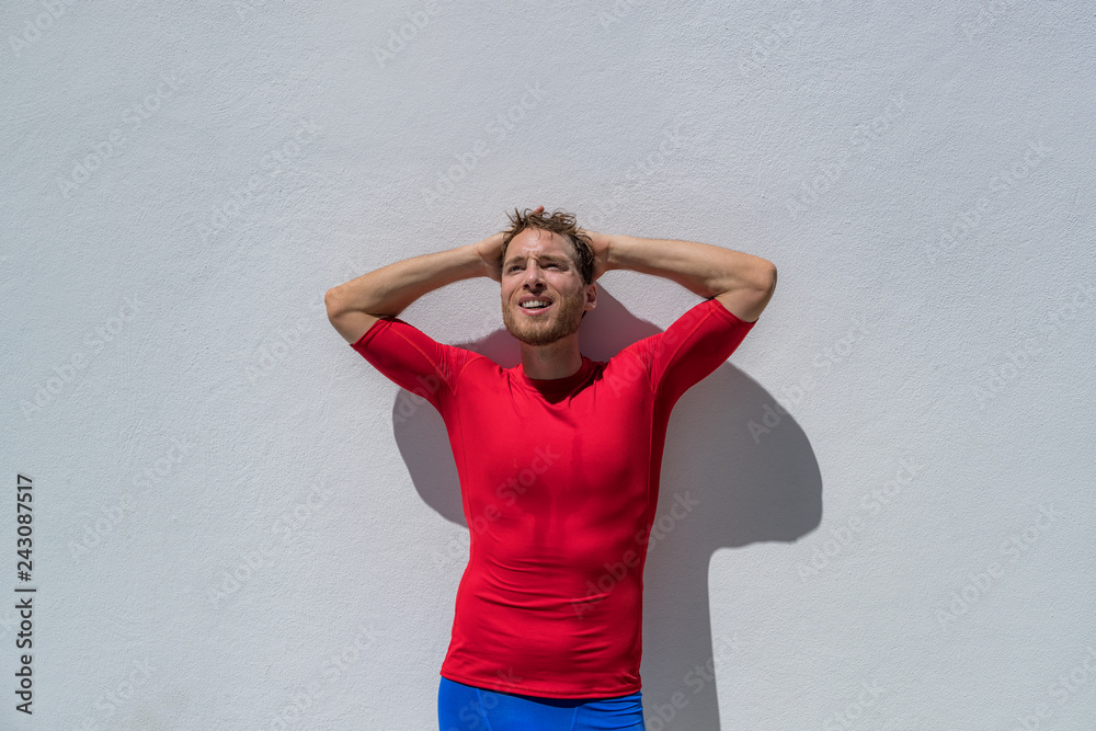 Fitness athlete man tired with headache or depresssion sweating breathing after difficult training. Mental health in sports, psychological help. Fitness athlete man tired with headache or depresssion sweating breathing after difficult training. Mental health in sports, psychological help.