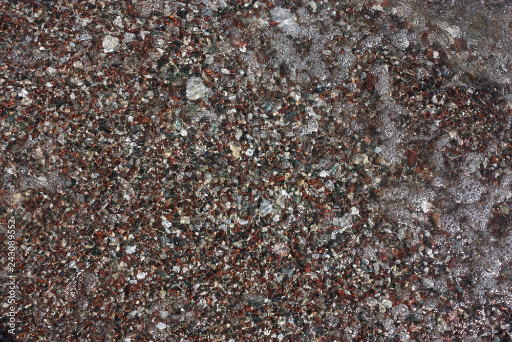 Pebbles in the sea water Pebbles in the sea water