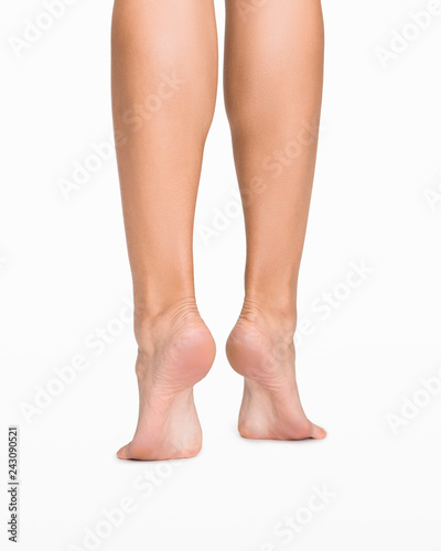 Perfect female legs isolated on white background