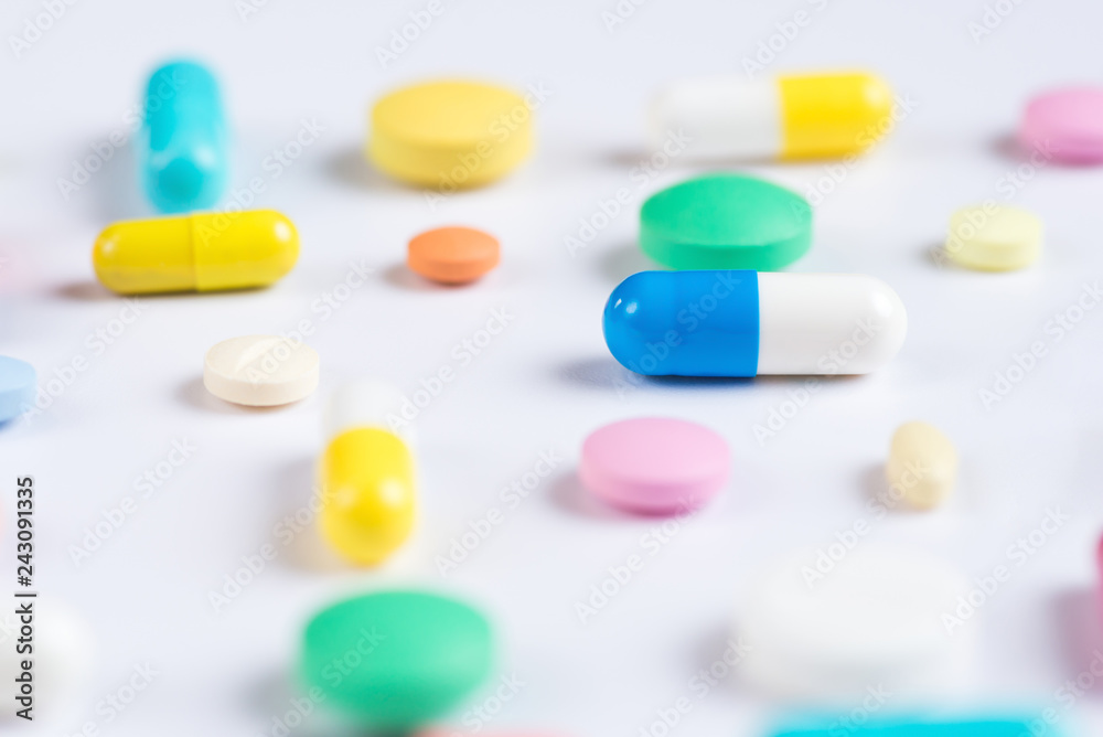 Tablets and pills on a white background Tablets and pills on a white background