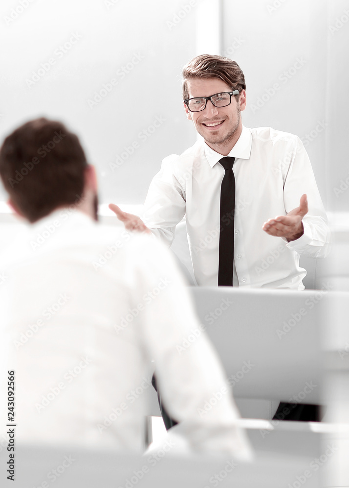 smiling businessman talking to a business partner