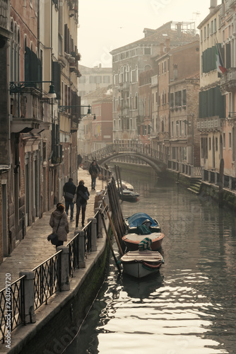 Morning view of Venetian street and canal