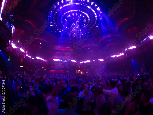 Canvas Print People are dancing in night club