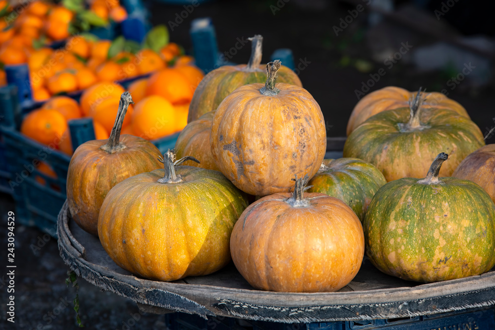 Pumpkins at farm market piled up ready to be sold. Pumpkins at farm market piled up ready to be sold.