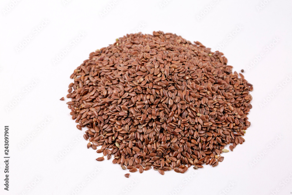 Pile of flax seeds isolated on white background close Pile of flax seeds isolated on white background close