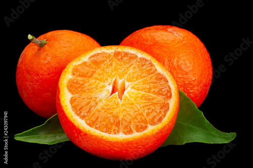 Clementine citrus fruit on black