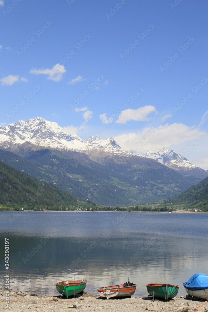 Lago di Poschiavo, a natural lake in the Poschiavo valley in the canton of Grisons, Switzerland