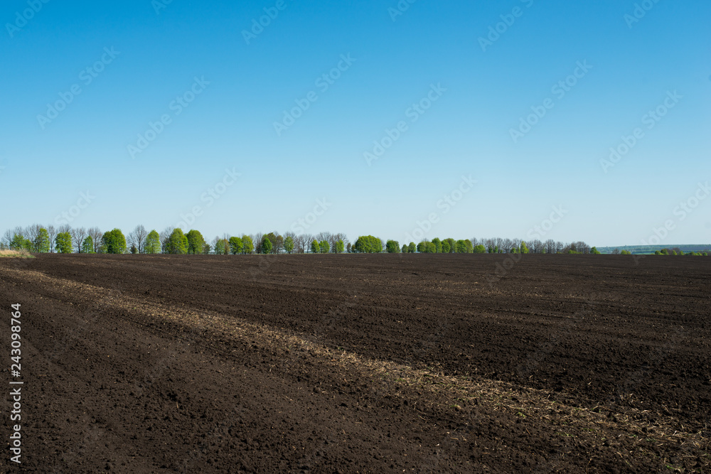 land in a field in spring after plowing