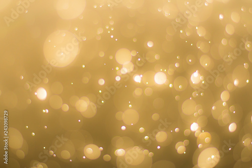 abstractr Gold background with blur bokeh light effect photo