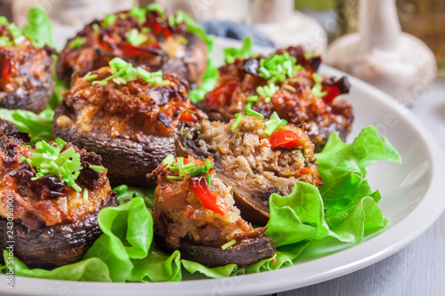 Baked champignon caps stuffed with minced meat