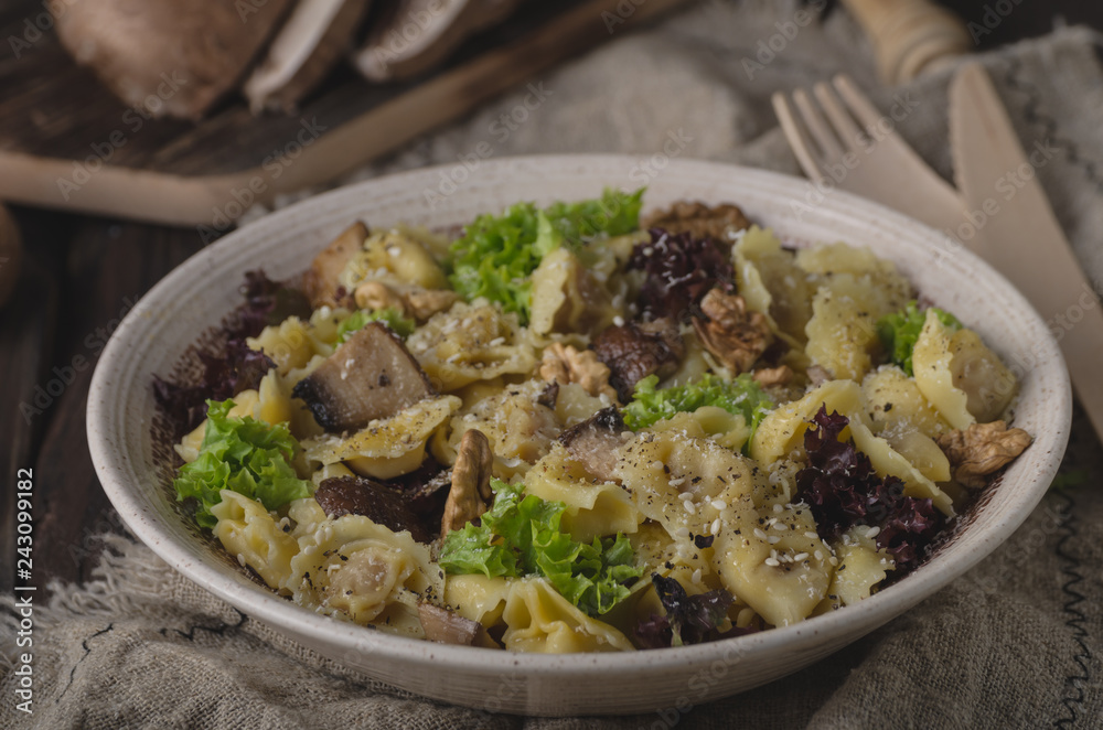 Homemade tortellini with mushrooms and walnuts Homemade tortellini with mushrooms and walnuts