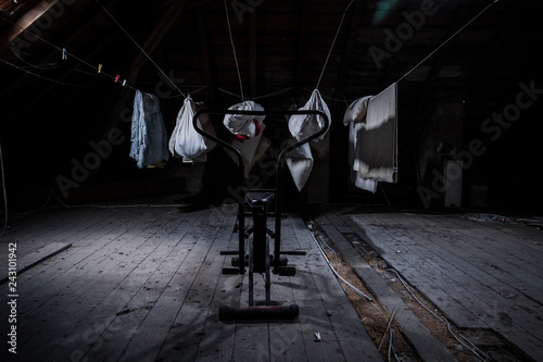 training bicycle and washing in the attic of an abandoned villa