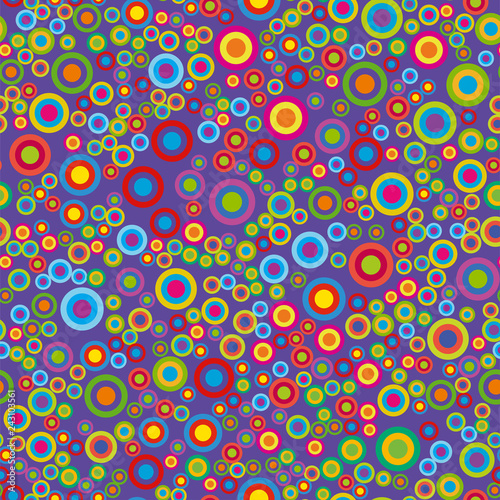 Colorful psychedelic circles on a violet background.