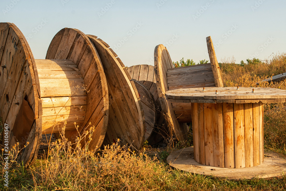 Obraz premium Large empty wooden cable reels