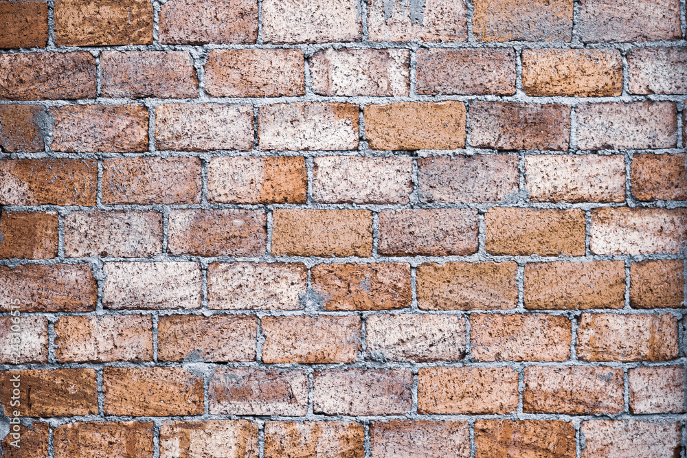 Fototapeta premium Old brown brick wall. Stone texture background