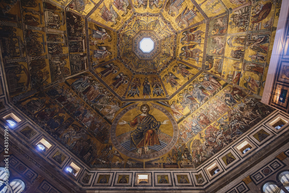 FLORENCE, ITALY - AUGUST 17, 2018: Interior view of the Baptistery of Saint John in Florence, Italy. The landmark features Florentine Romanesque style and has mosaics by Jacopo Torriti FLORENCE, ITALY - AUGUST 17, 2018: Interior view of the Baptistery of Saint John in Florence, Italy. The landmark features Florentine Romanesque style and has mosaics by Jacopo Torriti