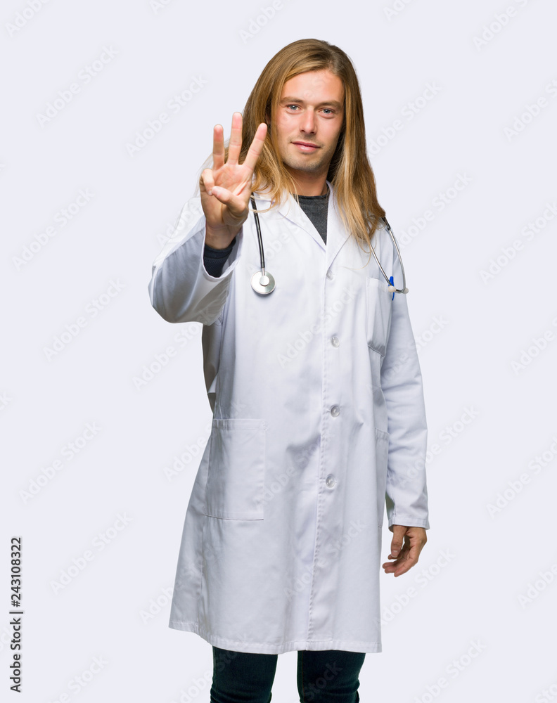 Doctor man happy and counting three with fingers on isolated background Doctor man happy and counting three with fingers on isolated background
