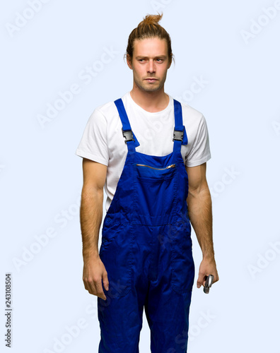 Workman feeling upset on isolated background