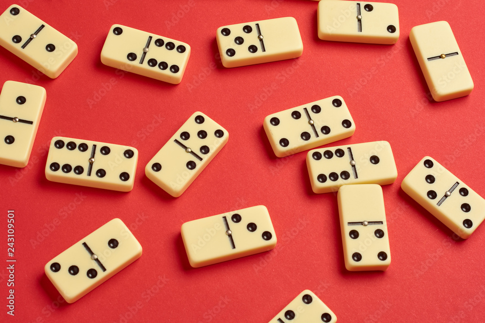 Domino game, colorful background with domino pieces on red. Domino game, colorful background with domino pieces on red.