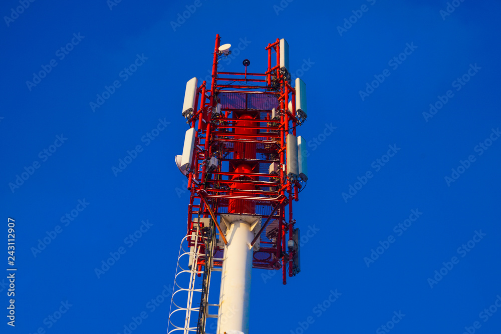 Fototapeta premium Antenna base station network mobile operator. Services for residents of a small town