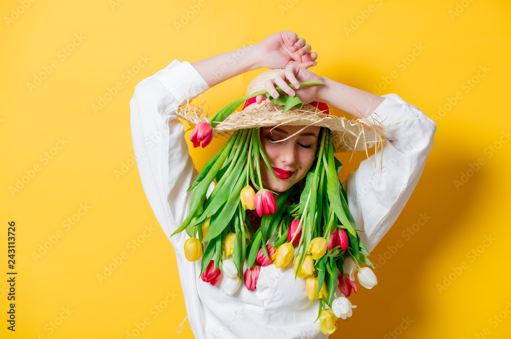 woman with fresh springtime tulips instead hair