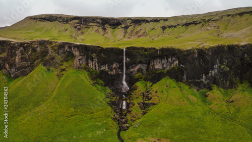 Panoramic landscape Foss a Sidu (Foss á Siðu) waterfall, Kirkjubæjarklaustur, Iceland. Aerial view shot by drone camera. photo