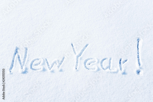 The inscription on the snow, happy new year