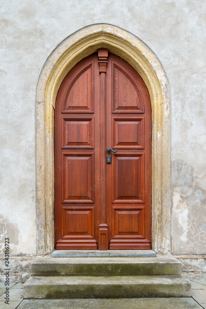 The old wooden door of the church. Rear entrance.