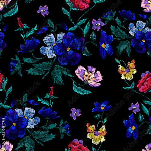 Embroidery seamless pattern with violet flowers. Vector embroidered floral design for fabric.