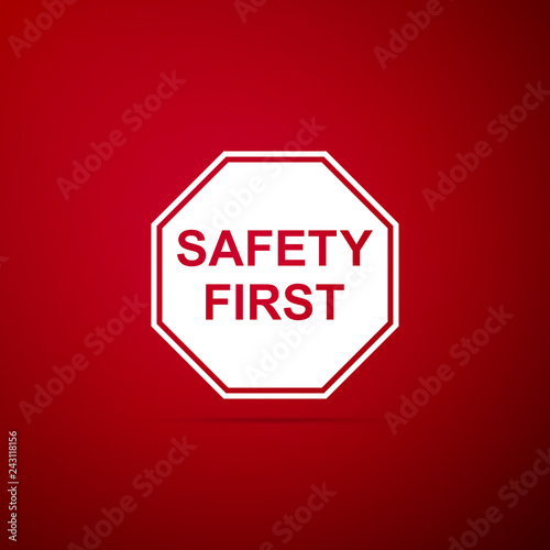 Safety First octagonal shape icon isolated on red background. Flat design. Vector Illustration