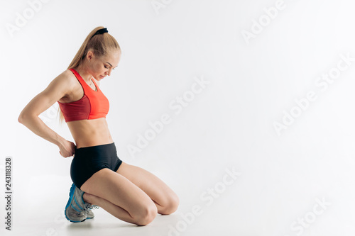 serious sportswoman is preparing for training, side view full length photo. copy space