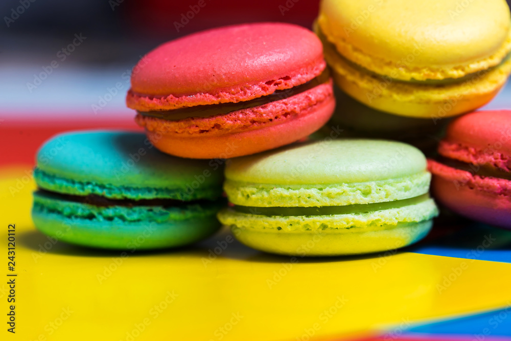 Close-up of delicious fresh macaroon with different fillings on the table, macro photo Close-up of delicious fresh macaroon with different fillings on the table, macro photo