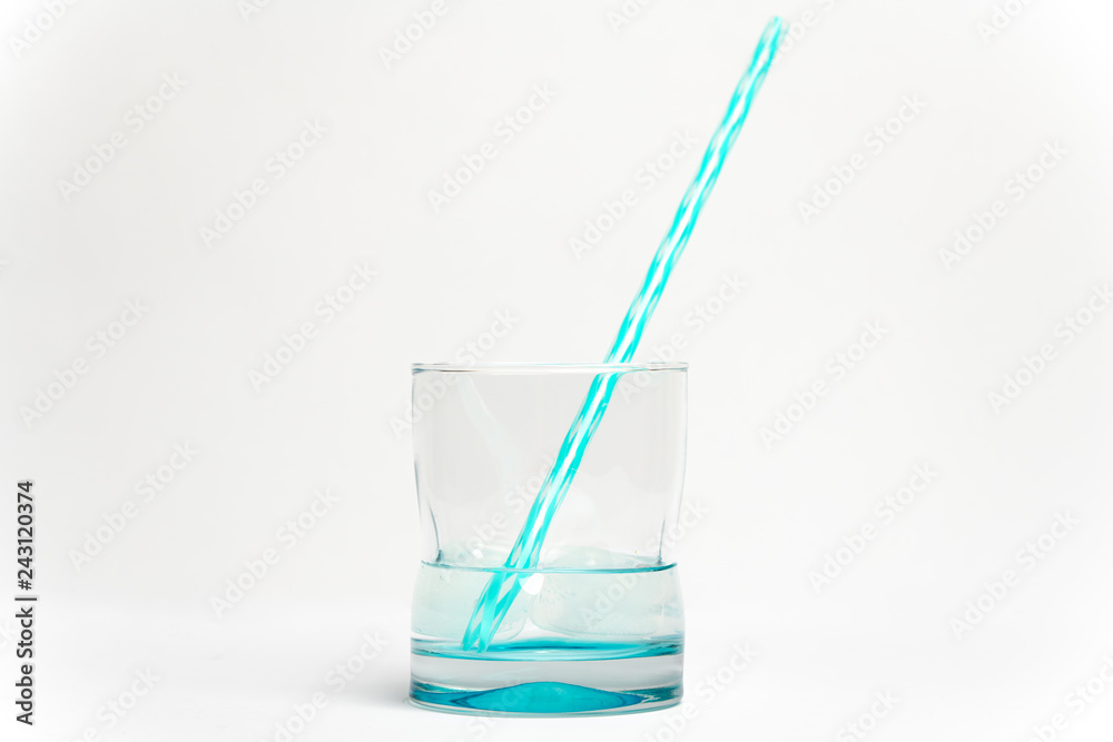 glass of water with drinking straw isolated on white glass of water with drinking straw isolated on white