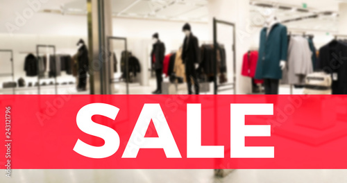 Sale banner with defocus fashion store background. Sale concept