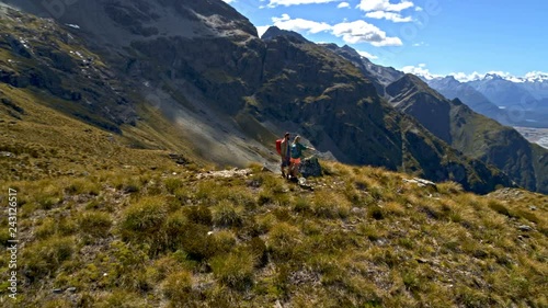 Aerial Caucasian hikers hiking Mount Aspiring New Zealand photo