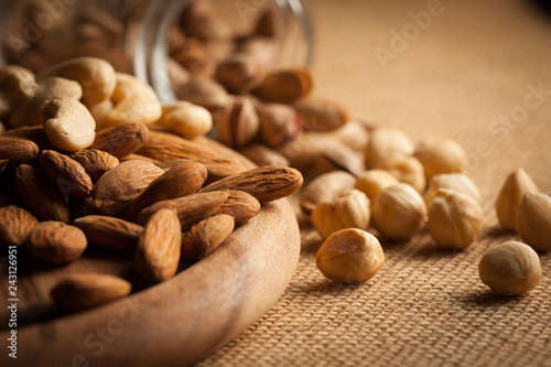mix of nuts on a wooden table